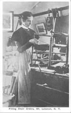 SA1405.13 - Image shows Sarah Collins working on a chair. Identified on both sides., Winterthur Shaker Photograph and Post Card Collection 1851 to 1921c